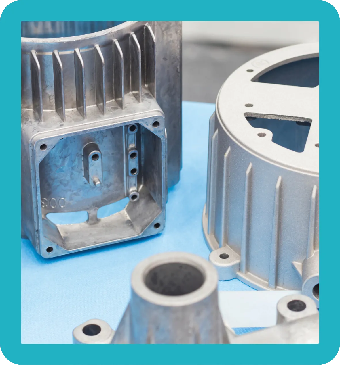 Aluminium Cast Aluminium cast objects sitting on a table.