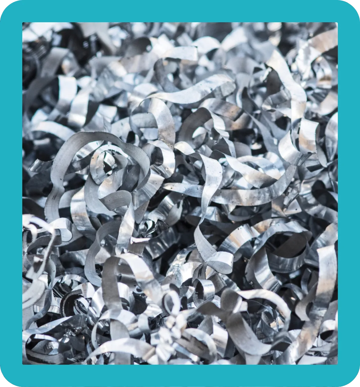 Aluminium Swarf Ground up piles of aluminium swarf.