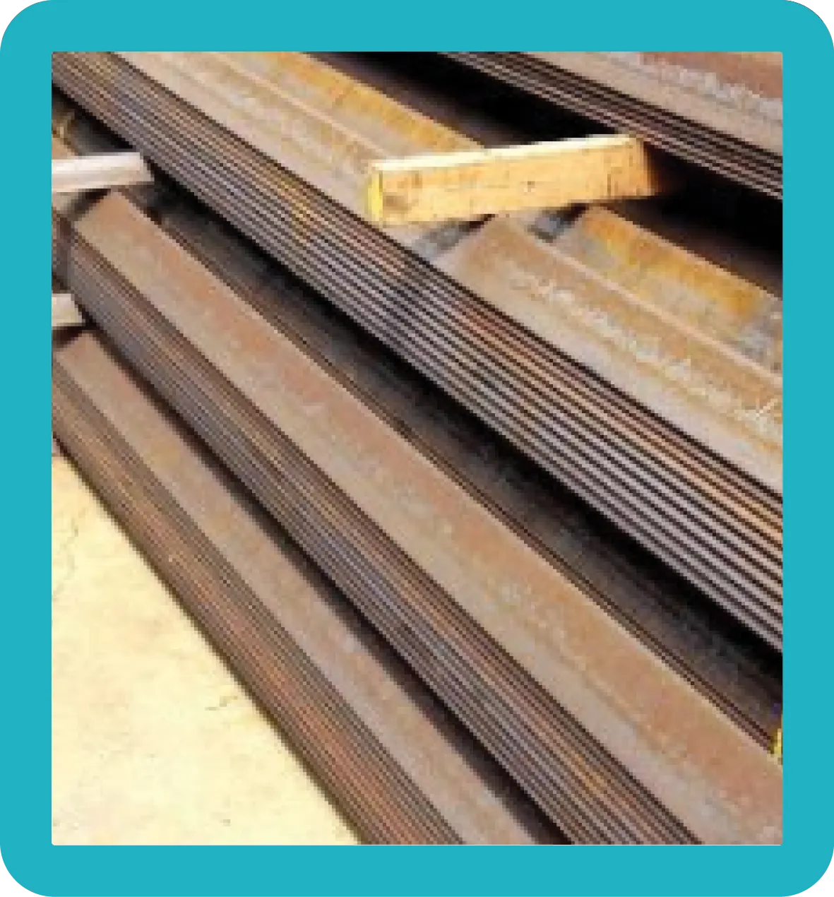 HMS Oversize Long piles neatly stacked showing HMS oversize.