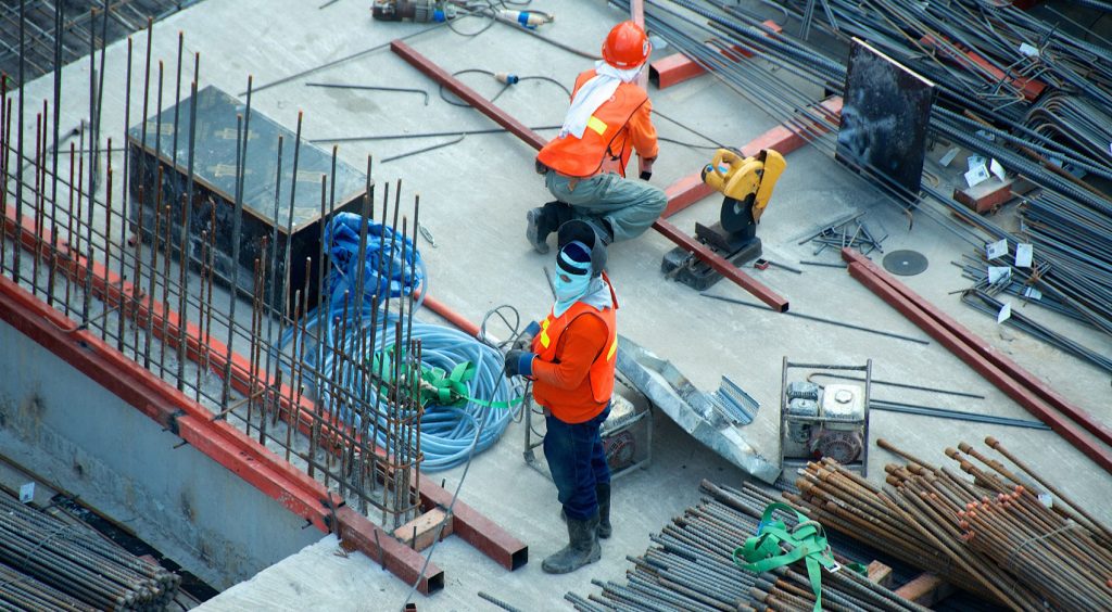 Two men on a construction site during daytime