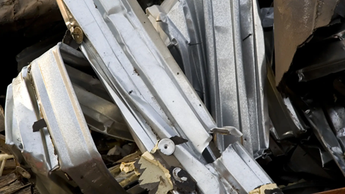Most expensive metals - scrap steel piled up together