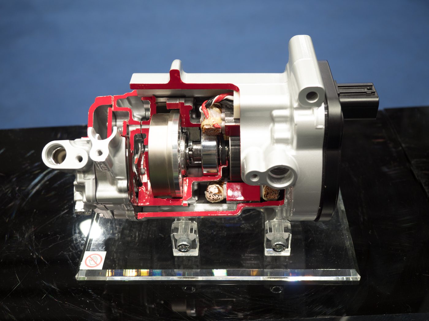 aircon compressor cutaway — aluminium body with steel internals